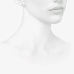 14k & diamond baby triangle skipping stone studs, .05ct