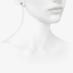14k & diamond encased flower studs, .26ct