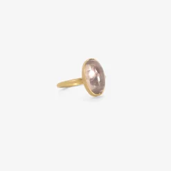 18k & elongated oval mauve sapphire ring