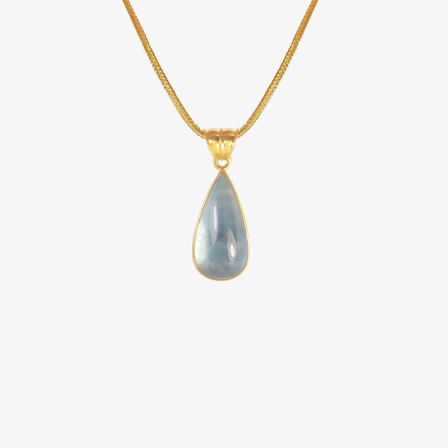 22k & elongated teardrop-shaped aquamarine pendant