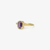 18k & emerald cut purple sapphire ring