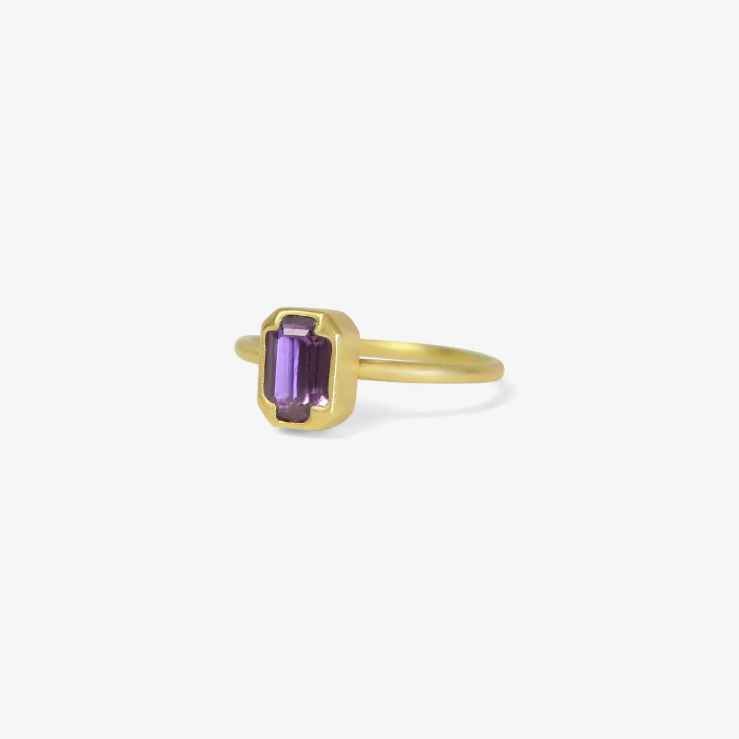 18k & emerald cut purple sapphire ring