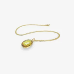 18k & oval yellow sapphire pendant, 7.34ct