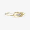 18k & platinum cuff bracelet with two diamond pavé quattros