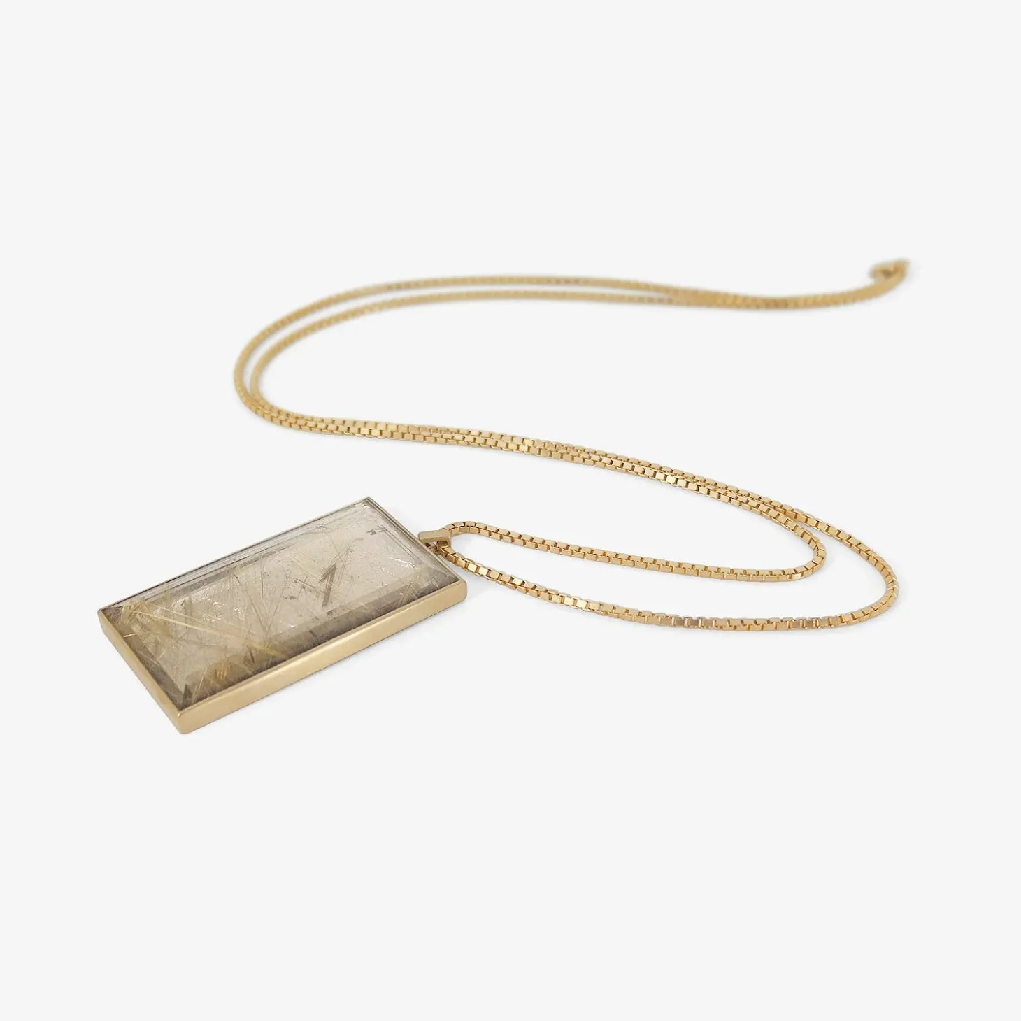 14k & rectangular rutilated quartz monolith pendant, 81.19ct