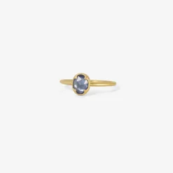 18k & small faceted oval blue sapphire ring, .55ct